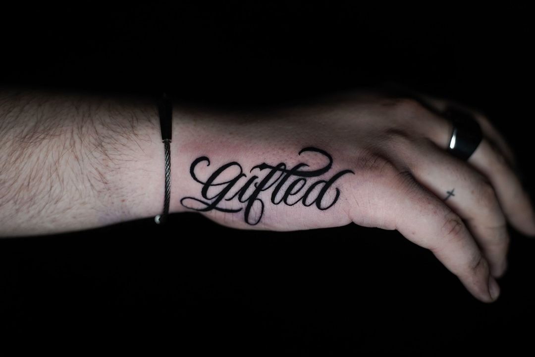 script tattoos wrist