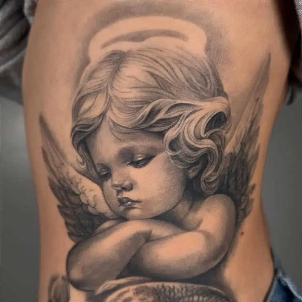 How to Choose a Tattoo Artist: What Actually Matters 1 Fully healed cherub tattoo by Skin Design Tattoos Honolulu tattoo artist